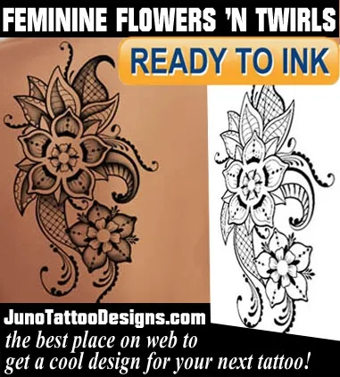 girly tattoo with flowers